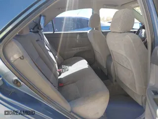 2004 Toyota Camry LE with VIN 4T1BE32K04U907223, listed as a IAAI auction lot 41795149 with 82,411 mi miles. Bid and sale history available at carsss.com. Image 8.