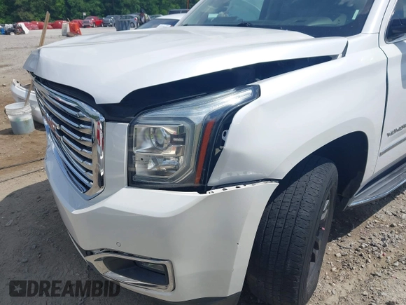 2017 GMC Yukon XL SLT z VIN 1GKS2GKC5HR160468, wystawiony jako IAAI lot #42166908 z przebiegiem 131 469 mil mil oraz . Historia ofert i sprzedaży dostępna na DreamBid. Obrazek 18.