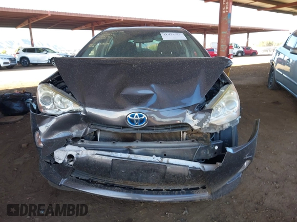 2014 Toyota Prius One with VIN JTDKDTB38E1572456, listed as a IAAI auction lot 41975766 with 88,075 mi miles and . Bid and sale history available at DreamBid. Image 11.