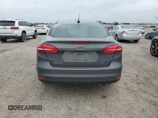 2018 Ford Focus SE z VIN 1FADP3F20JL223152, wystawiony jako Copart lot #51457695 z przebiegiem 118 240 mil mil oraz Czysty tytuł • Clean title. Historia ofert i sprzedaży dostępna na DreamBid. Obrazek 6.