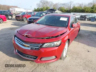 2014 Chevrolet Impala LT with VIN 2G1125S38E9314424, listed as a IAAI auction lot 41973052 with 186,209 mi miles and . Bid and sale history available at DreamBid. Image 6.