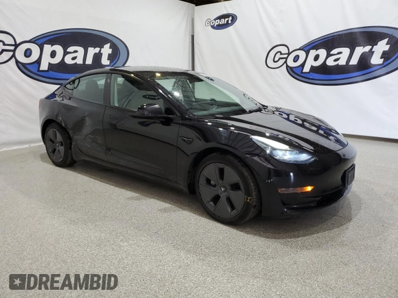 2023 Tesla Model 3 with VIN 5YJ3E1EA4PF452809, listed as a Copart auction lot 63688885 with 125,442 mi miles and Clean title. Bid and sale history available at DreamBid. Image 4.