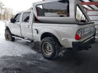 2015 Ford Super Duty F-250 SRW Lariat with VIN 1FT7W2BT9FEC51353, listed as a IAAI auction lot 41565239 with 140,000 mi miles. Bid and sale history available at carsss.com. Image 3.