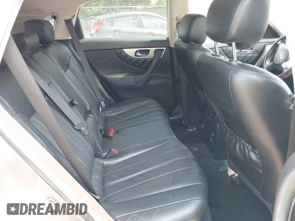 2015 Infiniti QX70 z VIN JN8CS1MU7FM380583, wystawiony jako IAAI lot #41937766 z przebiegiem 144 618 mil mil oraz . Historia ofert i sprzedaży dostępna na DreamBid. Obrazek 8.