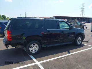 2011 Chevrolet Suburban LT with VIN 1GNSKJE34BR151246, listed as a IAAI auction lot 42520210 with 239,240 mi miles and . Bid and sale history available at DreamBid. Image 13.