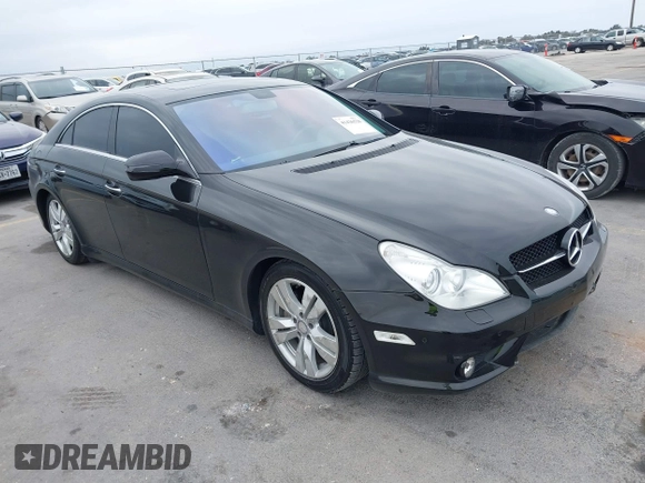 2009 Mercedes-Benz CLS-Class 5.5L with VIN WDDDJ72X99A141289, listed as a IAAI auction lot 41436528 with 126,649 mi miles. Bid and sale history available at carsss.com. Image 1.