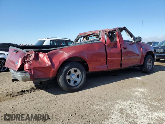 2000 Ford F-150 XL with VIN 1FTZX1728YNA87502, listed as a Copart auction lot 54870295 with 219,971 mi miles and Salvage title. Bid and sale history available at DreamBid. Image 3.
