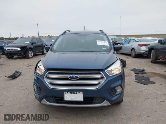 2018 Ford Escape SE with VIN 1FMCU0GD0JUC58115, listed as a IAAI auction lot 41578309 with 76,162 mi miles. Bid and sale history available at carsss.com. Image 12.