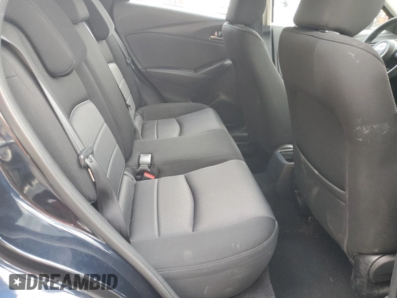 2018 Mazda CX-3 Sport z VIN JM1DKFB79J1323497, wystawiony jako Copart lot #56168875 z przebiegiem 60 284 mil mil oraz Szkoda całkowita • Salvage title. Historia ofert i sprzedaży dostępna na DreamBid. Obrazek 11.
