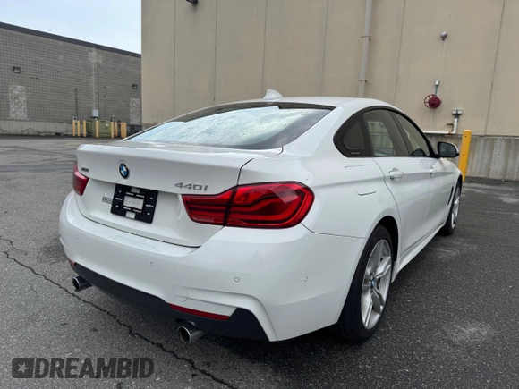 2019 BMW 4 Series 440i xDrive with VIN WBA4J7C54KBM74665, listed as a Copart auction lot 54988385 with 75,103 mi miles and Clean Title. Bid and sale history available at carsss.com. Image 4.