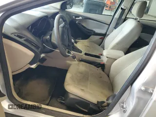 2018 Ford Focus SE z VIN 1FADP3FE9JL234158, wystawiony jako Copart lot #51788755 z przebiegiem 99 877 mil mil oraz Szkoda całkowita • Salvage title. Historia ofert i sprzedaży dostępna na DreamBid. Obrazek 7.