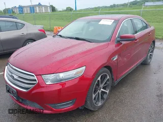 2014 Ford Taurus SEL z VIN 1FAHP2E83EG125622, wystawiony jako IAAI lot #42204238 z przebiegiem 134 032 mil mil oraz . Historia ofert i sprzedaży dostępna na DreamBid. Obrazek 2.
