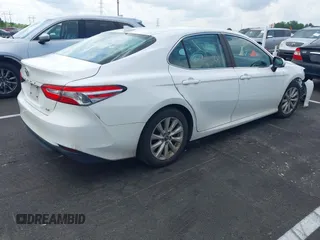 2019 Toyota Camry LE with VIN 4T1B11HK2KU743445, listed as a IAAI auction lot 42129688 with 284,938 mi miles and . Bid and sale history available at DreamBid. Image 4.
