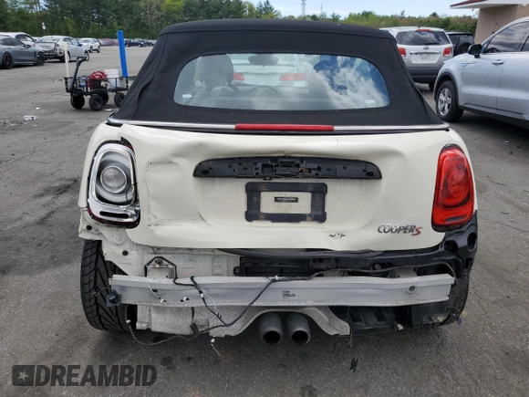 2017 MINI Convertible Cooper S с VIN WMWWG9C5XH3C80635, выставлен на аукционе Copart как лот 56167715 с пробегом 79 485 миль миль и Списание • Salvage title. История ставок и продаж доступна на DreamBid. Изображение 6.