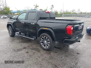 2024 GMC Canyon 4WD Denali with VIN 1GTP6FEK8R1133039, listed as a IAAI auction lot 41398204 with 7,735 mi miles and . Bid and sale history available at carsss.com. Image 3.