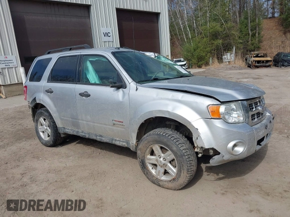 2010 Ford Escape Hybrid z VIN 1FMCU5K33AKC89835, wystawiony jako IAAI lot #41915349 z przebiegiem 125 659 mil mil oraz . Historia ofert i sprzedaży dostępna na DreamBid. Obrazek 1.