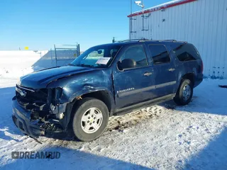 2008 Chevrolet Suburban Commercial with VIN 1GNFK16318J207263, listed as a IAAI auction lot 41246619 with 247,454 mi miles. Bid and sale history available at carsss.com. Image 2.