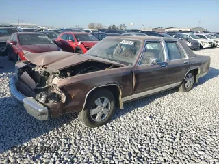 1990 Ford Crown Victoria z VIN 2FACP73F6LX168223, wystawiony jako Copart lot #52952615 z przebiegiem 11 698 mil mil oraz Szkoda całkowita • Salvage title. Historia ofert i sprzedaży dostępna na DreamBid. Obrazek 1.