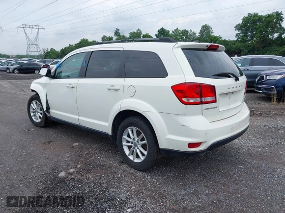 2017 Dodge Journey SXT with VIN 3C4PDDBG2HT702775, listed as a IAAI auction lot 42596303 with 130,639 mi miles and . Bid and sale history available at DreamBid. Image 3.