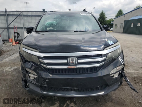 2017 Honda Pilot Touring with VIN 5FNYF6H90HB024321, listed as a Copart auction lot 57459895 with 134,244 mi miles and Salvage title. Bid and sale history available at DreamBid. Image 5.