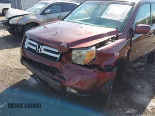 2007 Honda Pilot EX-L with VIN 5FNYF18547B006094, listed as a IAAI auction lot 42297719 with 235,632 mi miles and . Bid and sale history available at DreamBid. Image 6.
