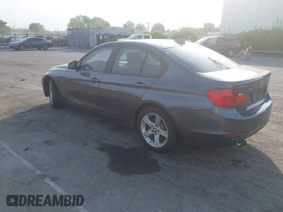 2013 BMW 3 Series 328i xDrive with VIN WBA3B3C53DJ810249, listed as a IAAI auction lot 42099473 with 125,255 mi miles. Bid and sale history available at carsss.com. Image 3.