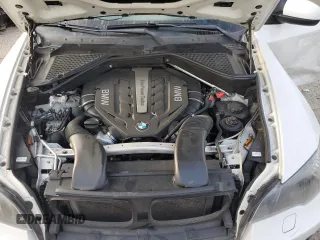 2012 BMW X6 50i z VIN 5UXFG8C59CL590549, wystawiony jako Copart lot #53071175 z przebiegiem 67 390 mil mil oraz Szkoda całkowita • Salvage title. Historia ofert i sprzedaży dostępna na DreamBid. Obrazek 11.