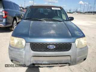 2001 Ford Escape XLS with VIN 1FMYU01BX1KB53168, listed as a Copart auction lot 76547834 with 71,025 mi miles and Salvage title. Bid and sale history available at DreamBid. Image 5.