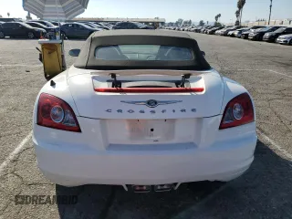 2006 Chrysler Crossfire Limited z VIN 1C3AN65L56X063644, wystawiony jako Copart lot #75004004 z przebiegiem Nie podano mil oraz Szkoda całkowita • Salvage title. Historia ofert i sprzedaży dostępna na DreamBid. Obrazek 6.