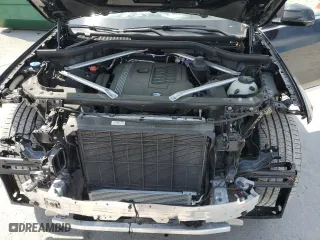 2022 BMW X7 xDrive40i with VIN 5UXCW2C05N9N00658, listed as a Copart auction lot 52007945 with 23,690 mi miles and Salvage Title. Bid and sale history available at carsss.com. Image 12.