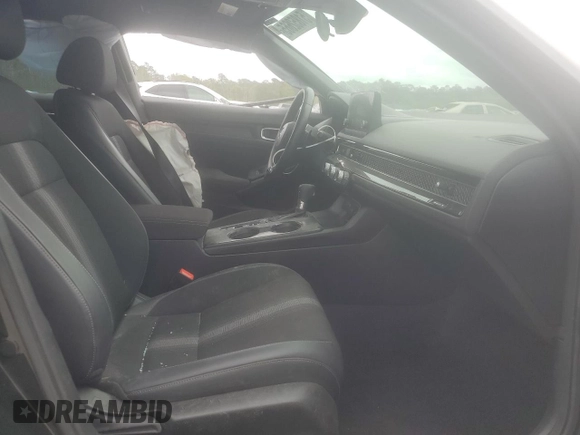 2023 Honda Civic Sport z VIN 2HGFE2F57PH520634, wystawiony jako Copart lot #51852665 z przebiegiem 52 641 mil mil oraz Szkoda całkowita • Salvage title. Historia ofert i sprzedaży dostępna na DreamBid. Obrazek 7.
