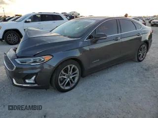 2019 Ford Fusion Hybrid Titanium with VIN 3FA6P0RU3KR138040, listed as a Copart auction lot 70843932 with 68,133 mi miles. Bid and sale history available at carsss.com. Image 1.