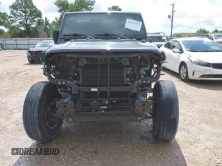 2019 Jeep Wrangler Unlimited Sahara with VIN 1C4HJXEN9KW514880, listed as a IAAI auction lot 42319437 with 70,186 mi miles and . Bid and sale history available at DreamBid. Image 13.