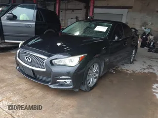 2015 Infiniti Q50 with VIN JN1BV7AP1FM342558, listed as a IAAI auction lot 42729484 with 142,235 mi miles and . Bid and sale history available at DreamBid. Image 2.