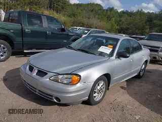 2004 Pontiac Grand Am SE1 with VIN 1G2NF52E34C257673, listed as a IAAI auction lot 41785458 with 157,473 mi miles. Bid and sale history available at carsss.com. Image 2.
