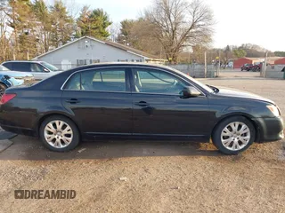 2010 Toyota Avalon XL with VIN 4T1BK3DB0AU355952, listed as a IAAI auction lot 41834083 with 177,098 mi miles and . Bid and sale history available at DreamBid. Image 13.