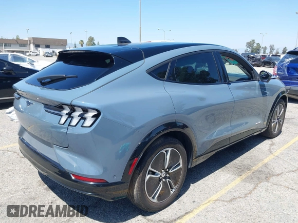 2023 Ford Mustang Mach-E Premium z VIN 3FMTK3R47PMA60861, wystawiony jako IAAI lot #42311615 z przebiegiem 27 469 mil mil oraz . Historia ofert i sprzedaży dostępna na DreamBid. Obrazek 4.