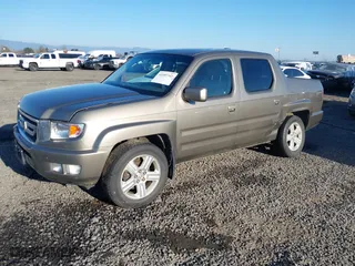 2009 Honda Ridgeline RTL with VIN 2HJYK16529H500753, listed as a IAAI auction lot 41687342 with 216,499 mi miles. Bid and sale history available at carsss.com. Image 17.