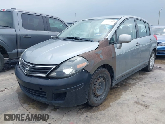 2011 Nissan Versa 1.8 S with VIN 3N1BC1CP9BL451970, listed as a IAAI auction lot 42206243 with 301,400 mi miles. Bid and sale history available at carsss.com. Image 2.