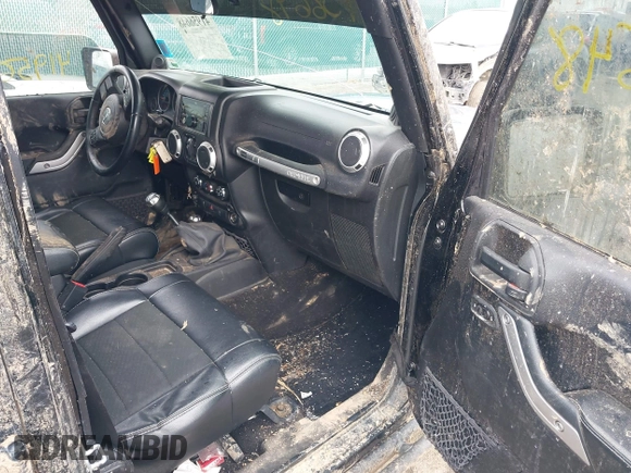 2012 Jeep Wrangler Unlimited Call of Duty MW3 z VIN 1C4BJWFG0CL202238, wystawiony jako IAAI lot #41956648 z przebiegiem 92 572 mil mil oraz . Historia ofert i sprzedaży dostępna na DreamBid. Obrazek 5.