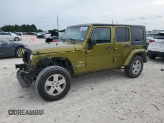 2007 Jeep Wrangler Unlimited Sahara z VIN 1J8GA59127L217412, wystawiony jako Copart lot #54922765 z przebiegiem 115 377 mil mil oraz Szkoda całkowita • Salvage title. Historia ofert i sprzedaży dostępna na DreamBid. Obrazek 1.