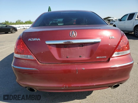 2007 Acura RL Technology z VIN JH4KB16677C004641, wystawiony jako Copart lot #59049755 z przebiegiem 176 704 mil mil oraz Szkoda całkowita • Salvage title. Historia ofert i sprzedaży dostępna na DreamBid. Obrazek 6.