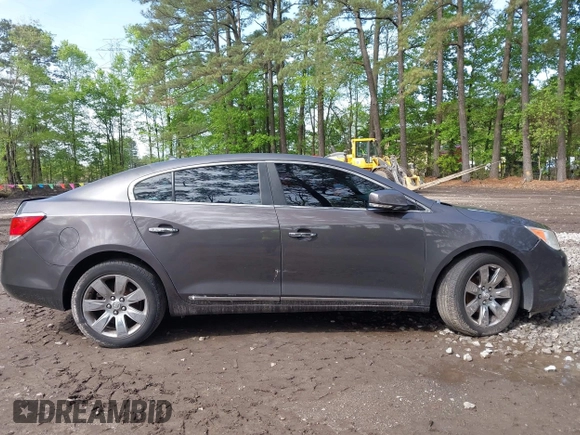 2012 Buick LaCrosse Premium 3 z VIN 1G4GH5E31CF310937, wystawiony jako IAAI lot #42092530 z przebiegiem 165 295 mil mil oraz . Historia ofert i sprzedaży dostępna na DreamBid. Obrazek 13.
