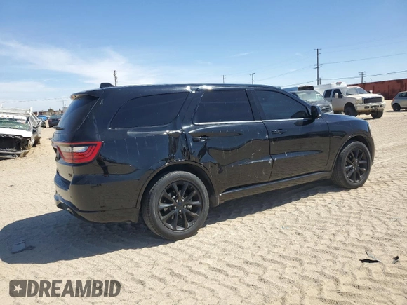 2017 Dodge Durango R/T with VIN 1C4SDHCT0HC789424, listed as a Copart auction lot 57357105 with 119,017 mi miles and Salvage title. Bid and sale history available at DreamBid. Image 3.