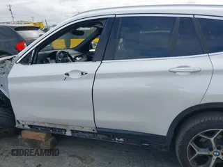 2018 BMW X1 sDrive28i with VIN WBXHU7C38J5L05985, listed as a IAAI auction lot 42014649 with 77,082 mi miles. Bid and sale history available at carsss.com. Image 15.