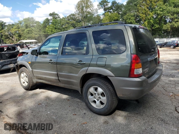 2002 Mazda Tribute LX with VIN 4F2YU09122KM55085, listed as a Copart auction lot 71604184 with 185,158 mi miles and Salvage Title. Bid and sale history available at DreamBid. Image 2.