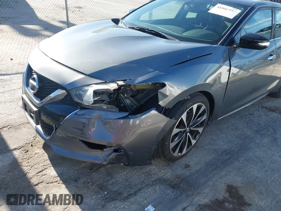2018 Nissan Maxima Platinum z VIN 1N4AA6AP7JC392710, wystawiony jako IAAI lot #41866951 z przebiegiem 49 026 mil mil oraz . Historia ofert i sprzedaży dostępna na DreamBid. Obrazek 6.