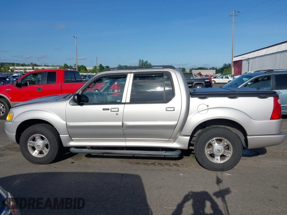 2004 Ford Explorer Sport Trac XLS z VIN 1FMDU77K74UB69268, wystawiony jako IAAI lot #42055157 z przebiegiem 127 573 mil mil oraz . Historia ofert i sprzedaży dostępna na DreamBid. Obrazek 14.