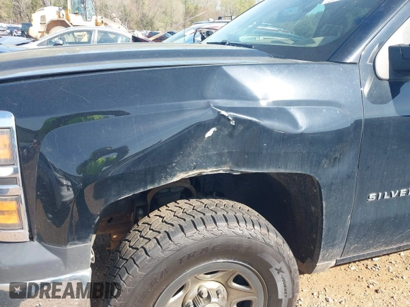 2014 Chevrolet Silverado 1500 Work Truck with VIN 3GCUKPEH5EG223592, listed as a IAAI auction lot 41909067 with 264,330 mi miles and . Bid and sale history available at DreamBid. Image 17.