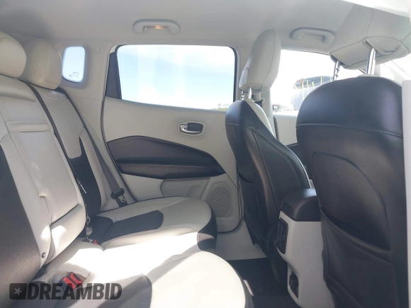2020 Jeep Compass Limited with VIN 3C4NJDCB8LT127027, listed as a IAAI auction lot 41724110 with 94,896 mi miles and . Bid and sale history available at DreamBid. Image 8.